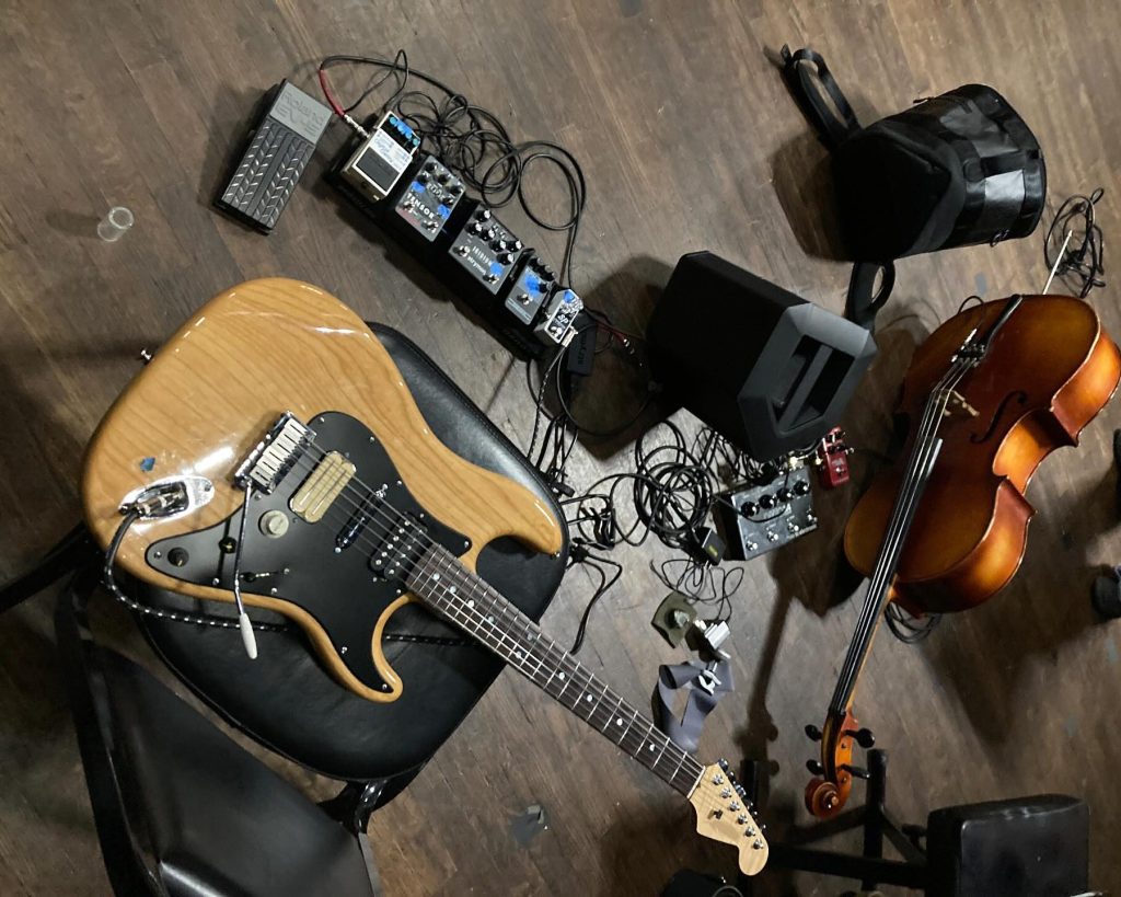 Electric guitar, cello, a smattering of foot pedals attached to both